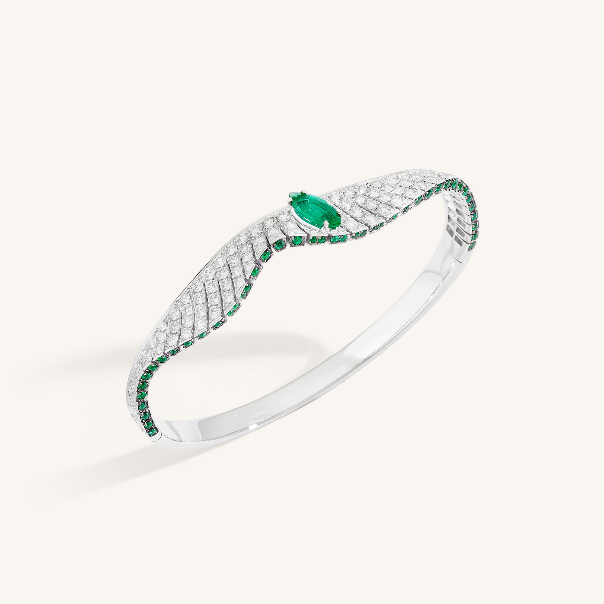 Abissi bangle with emeralds