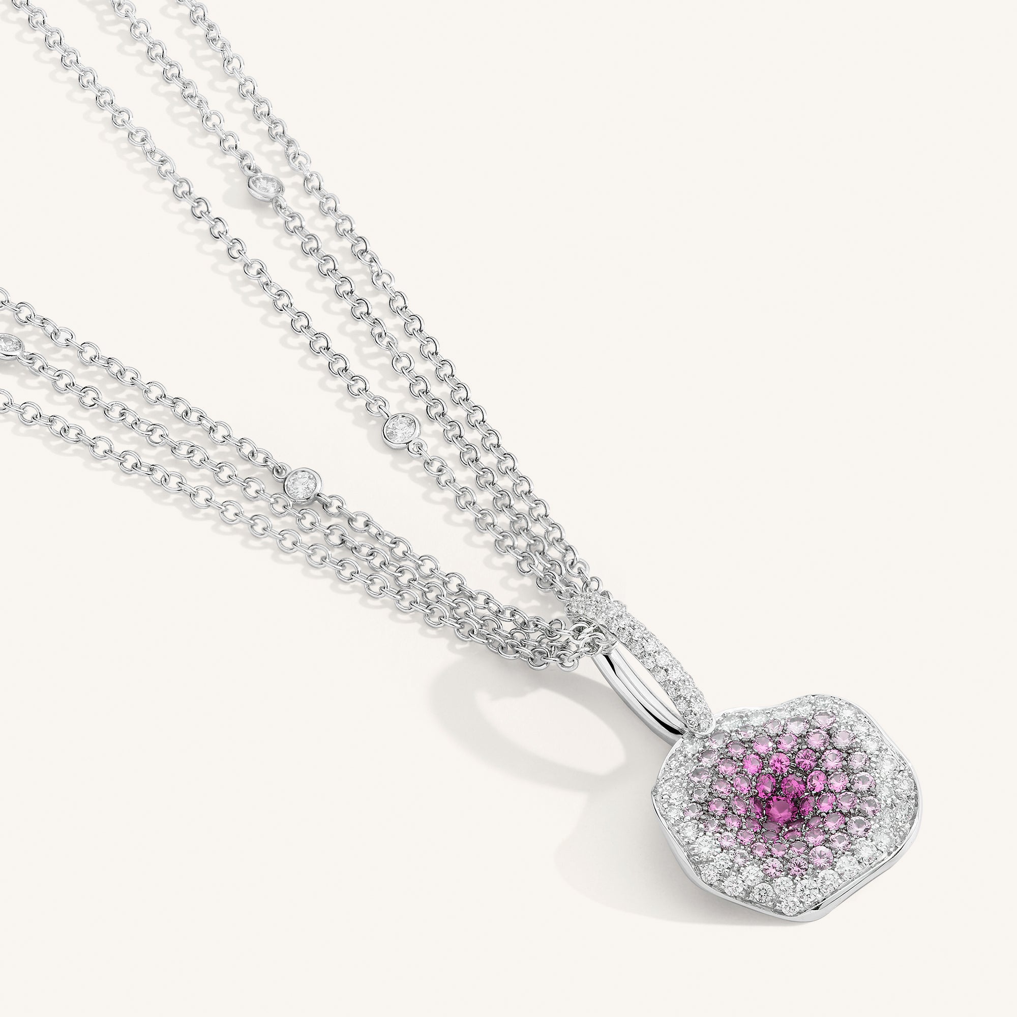 Moon Flowers pendant with white diamonds and sapphires