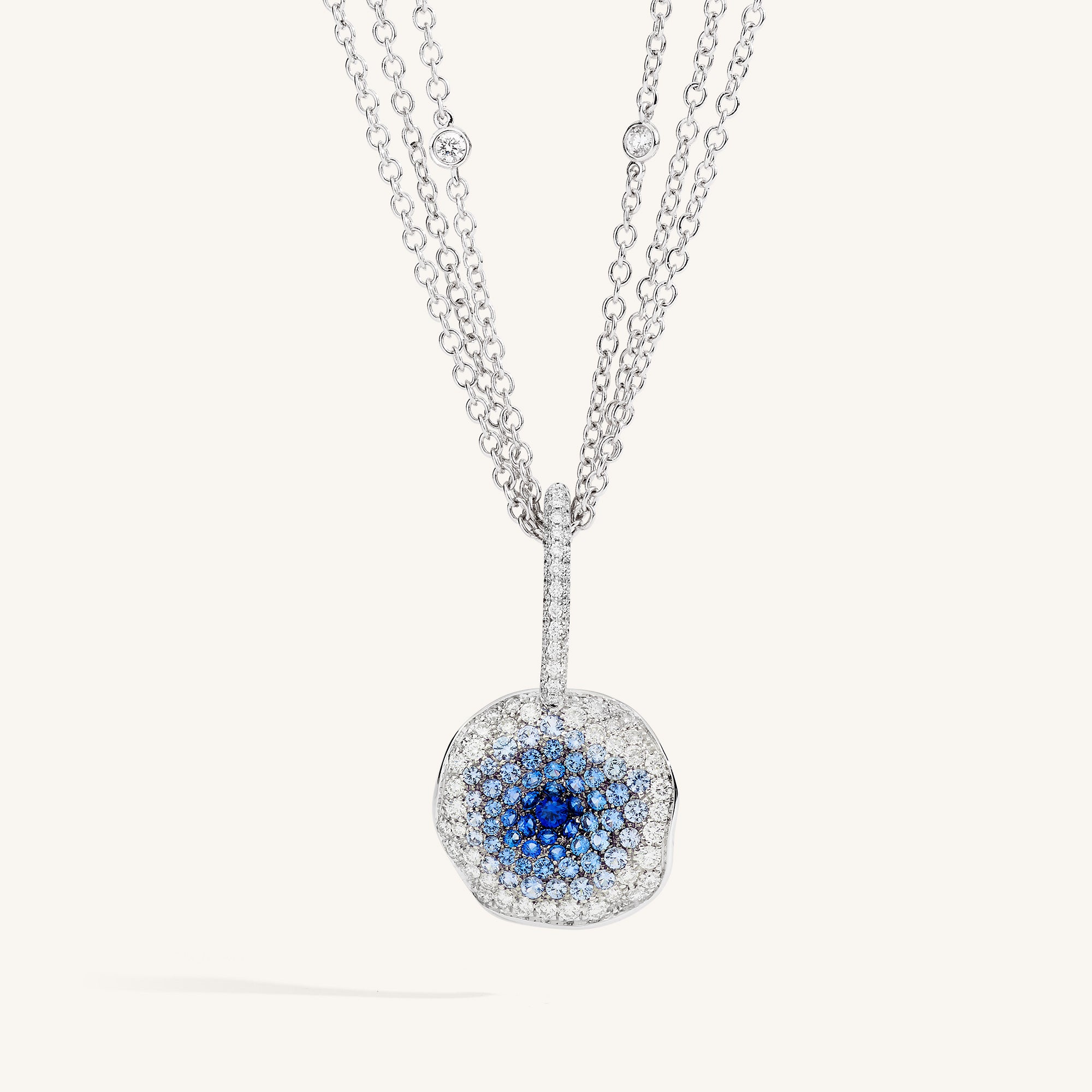 Moon Flowers pendant with white diamonds and sapphires
