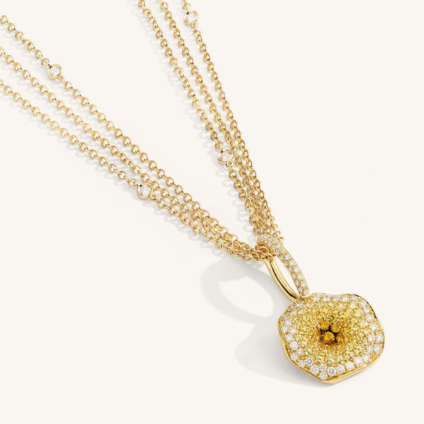 Moon Flowers pendant with white diamonds and sapphires