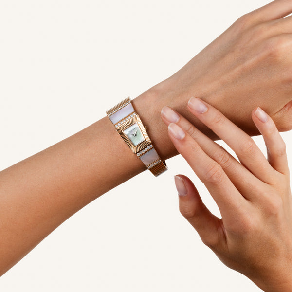Cleopatra watch with white diamonds and mother of pearl on rose gold