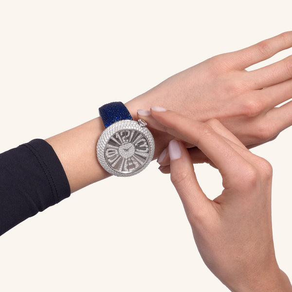 Alter 44mm case watch with blue sapphires and white diamonds