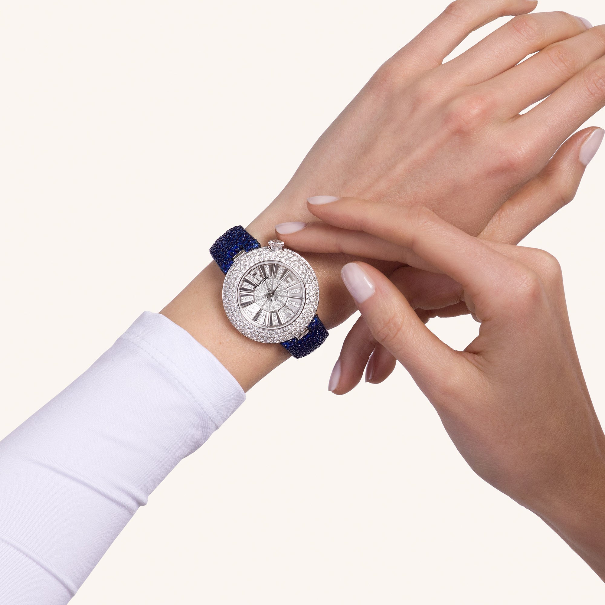 Alter 39mm case watch with blue sapphires and white diamonds