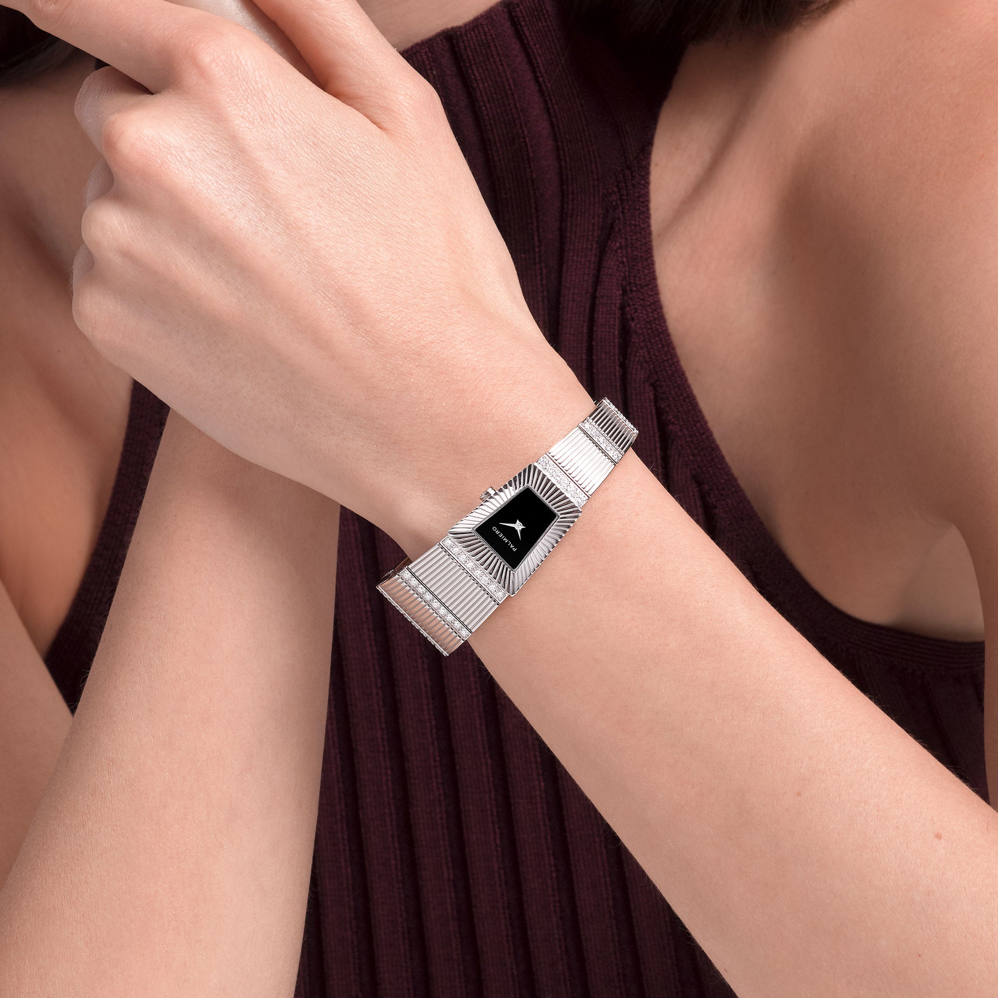 Cleopatra watch with onyx dial and white diamonds on white gold