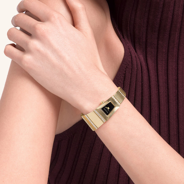 Cleopatra watch with onyx dial and white diamonds on yellow gold