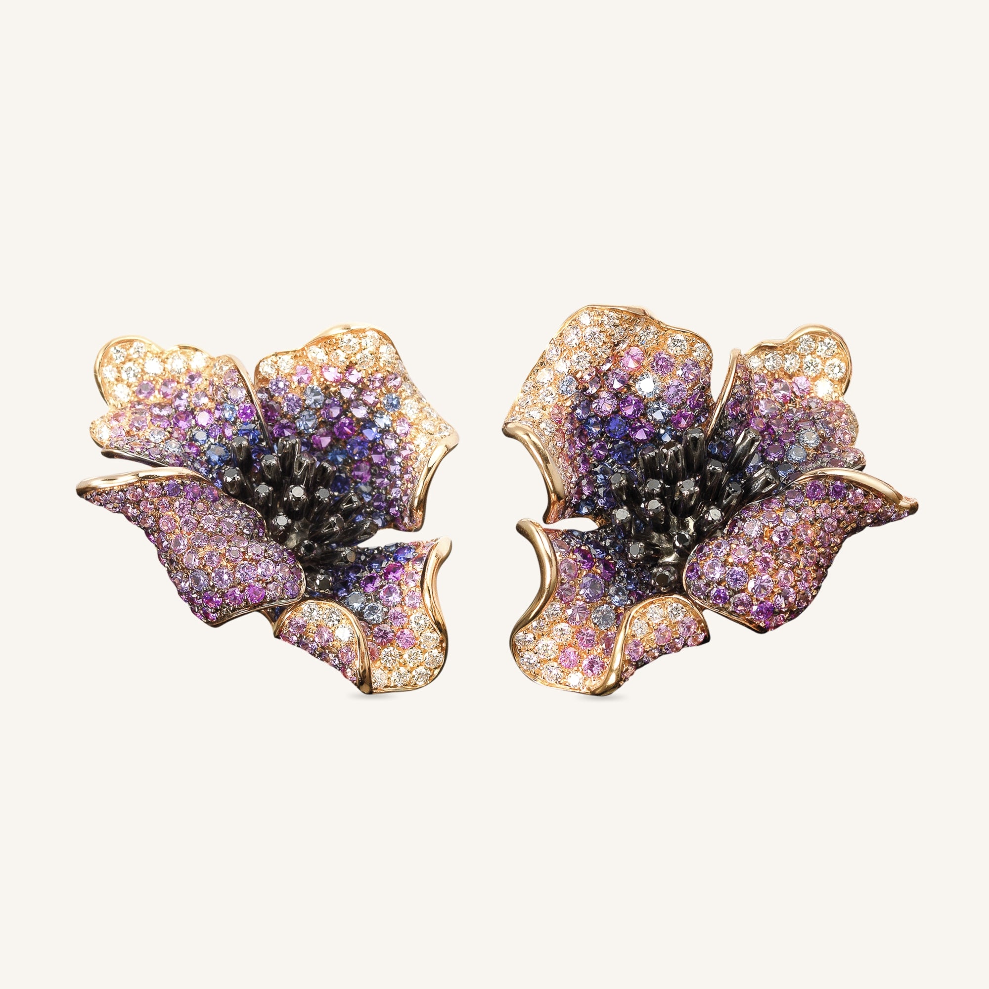 The Poppy Undressed earrings with white, black diamonds and sapphires