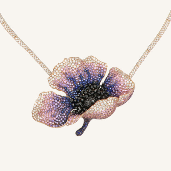 The Poppy Undressed pendant/brooch with white, black diamonds and sapphires