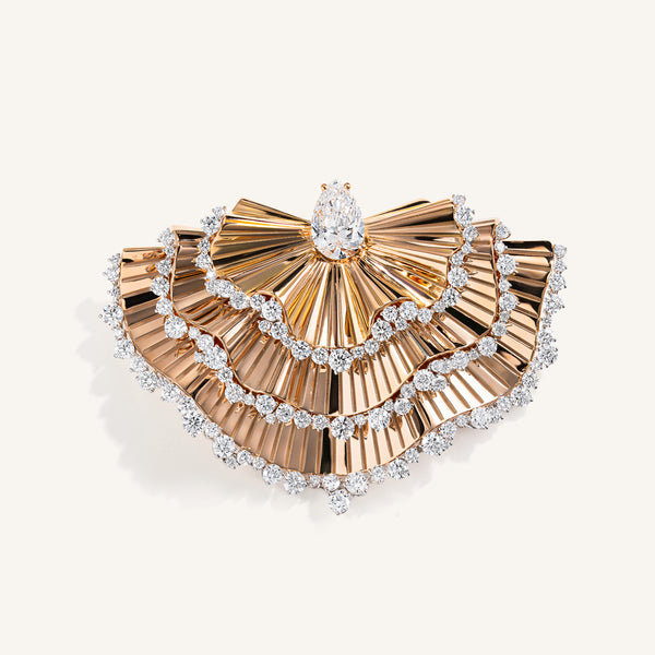 Rays of sun brooch with white diamonds