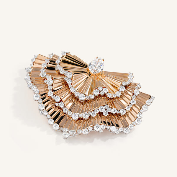Rays of sun brooch with white diamonds